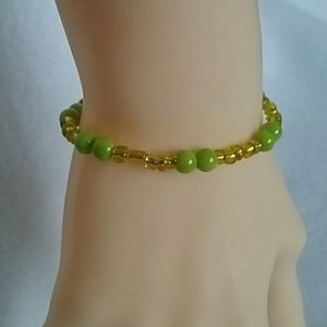 Girls green & yellow beaded stretch bracelet